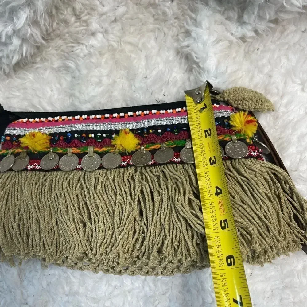- Elliott Mann Indie multi color clutch with beads and coins accents.